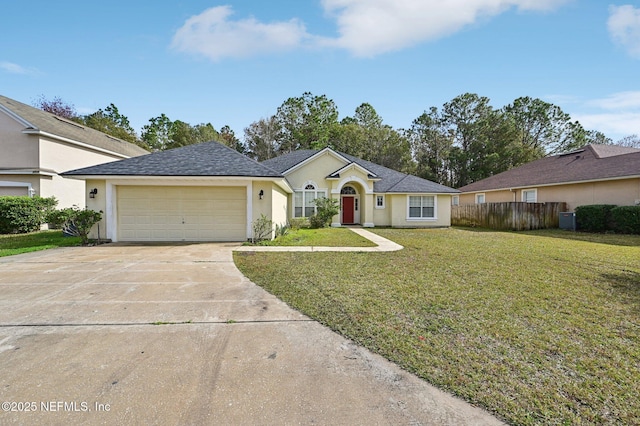 ranch-style house with a garage and a front lawn