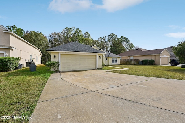 single story home featuring a front lawn and a garage