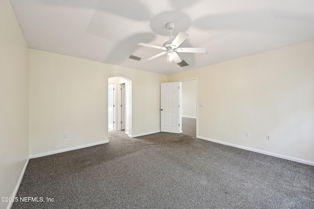 carpeted empty room featuring ceiling fan