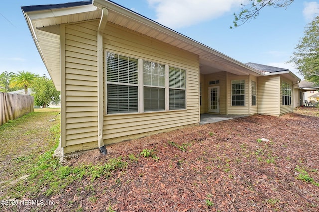 back of property with a patio area