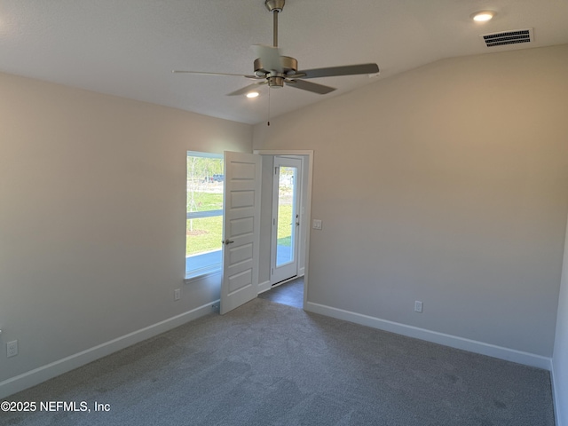 8195 Elsdon St, Jacksonville, FL 32219 - carpeted spare room with baseboards, visible vents, ceiling fan, and vaulted ceiling