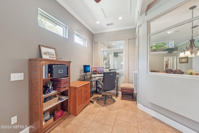 office with a notable chandelier, light tile patterned floors, and crown molding