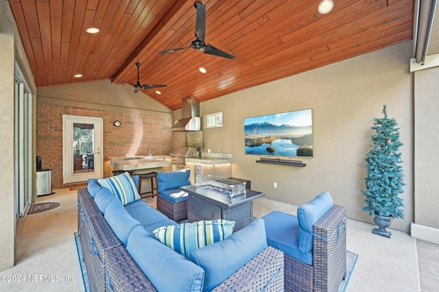 home theater room featuring lofted ceiling with beams, brick wall, and wooden ceiling