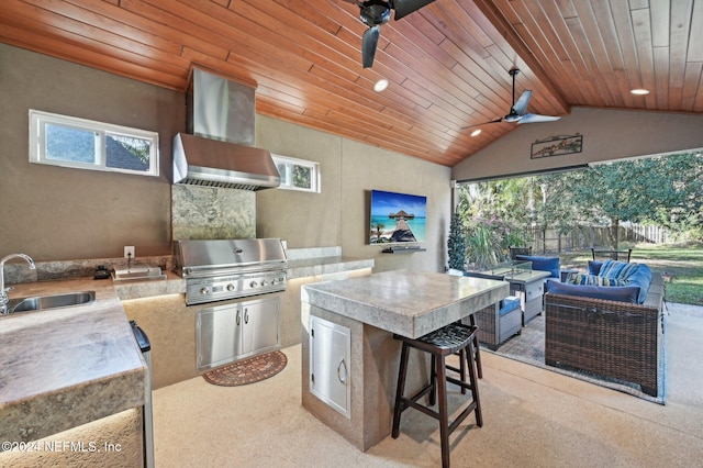 view of patio / terrace with area for grilling, an outdoor living space, ceiling fan, an outdoor wet bar, and a grill