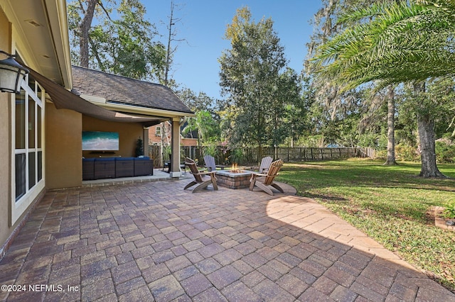 view of patio / terrace with an outdoor fire pit