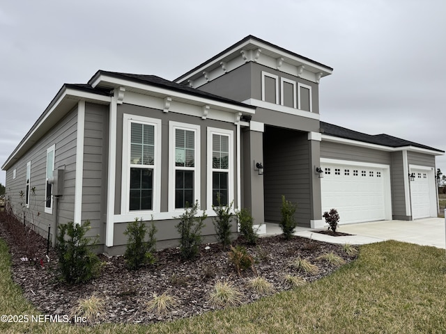 view of front of house featuring driveway and an attached garage