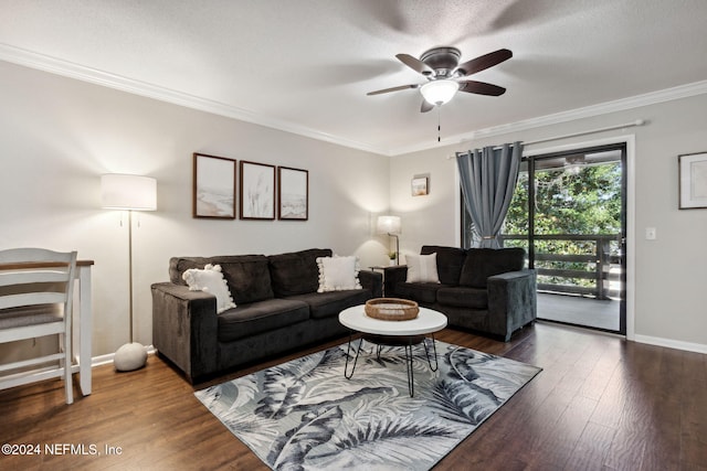 living room with a textured ceiling, dark hardwood / wood-style floors, ceiling fan, and crown molding