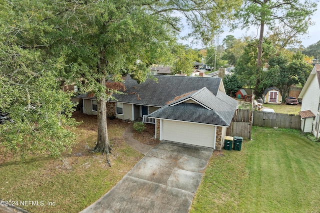 single story home with a front lawn and a garage