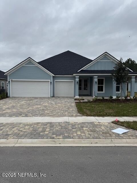 view of front of home with a garage