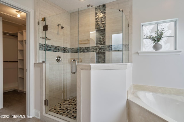 bathroom with independent shower and bath