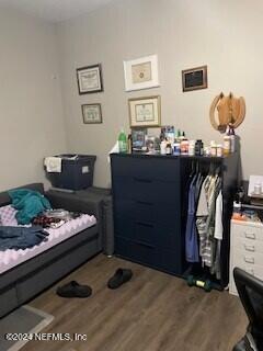 bedroom featuring hardwood / wood-style floors