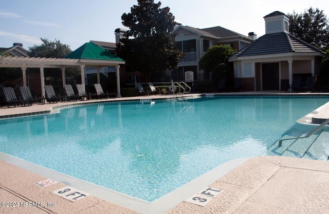 view of pool featuring a pergola