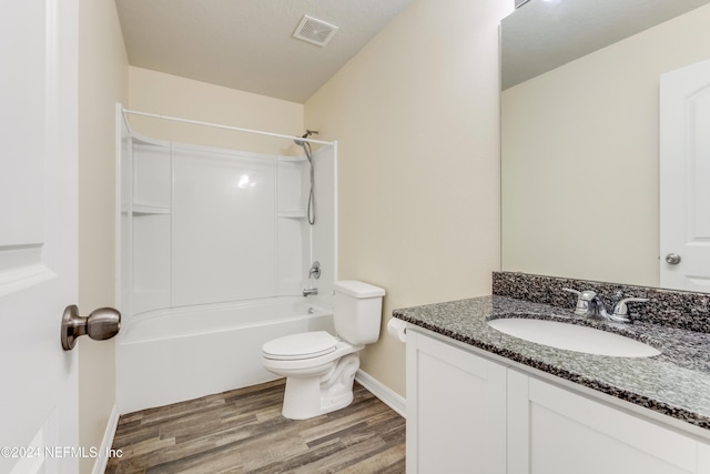 full bathroom with shower / bath combination, vanity, toilet, and wood-type flooring