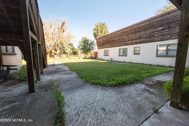 11289 SW 85th Ave, Hampton, FL 32044 - view of grassy yard featuring a patio area