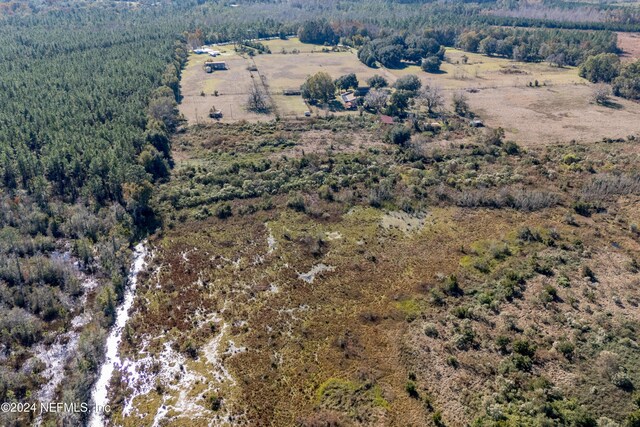 11289 SW 85th Ave, Hampton, FL 32044 - aerial view of property and surrounding area featuring a heavily wooded area