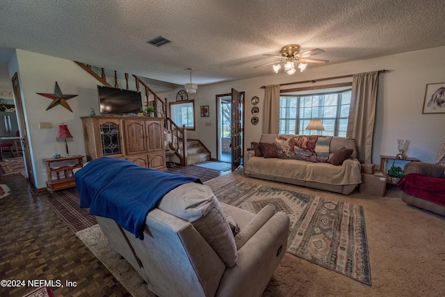 11289 SW 85th Ave, Hampton, FL 32044 - living room with stairway, a textured ceiling, and ceiling fan