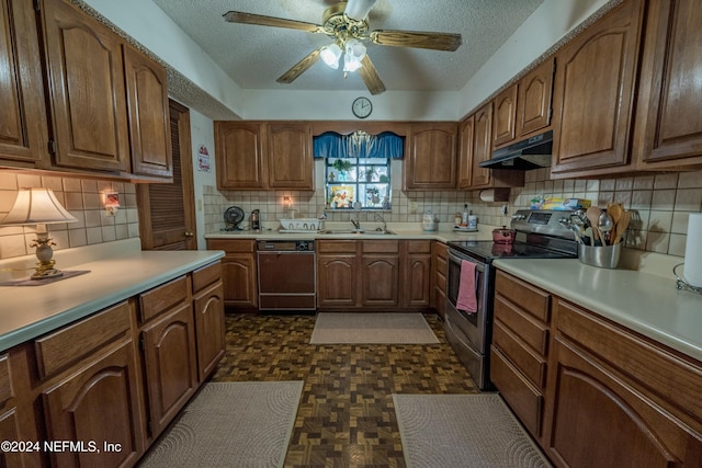 kitchen featuring dishwasher, a textured ceiling, tasteful backsplash, and electric stove