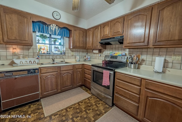 kitchen featuring stainless steel range with electric stovetop, dishwasher, dark parquet floors, sink, and a textured ceiling