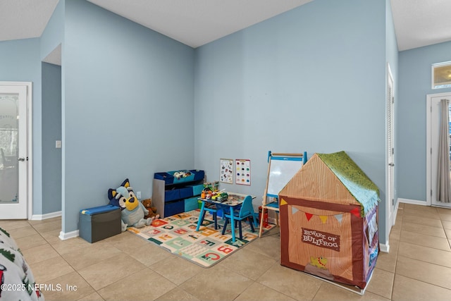 recreation room featuring light tile patterned flooring