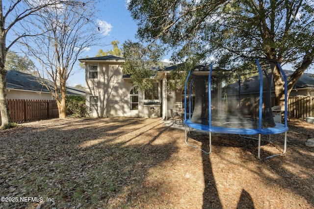 view of yard with a trampoline