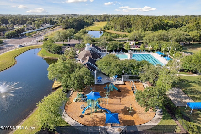 birds eye view of property with a water view