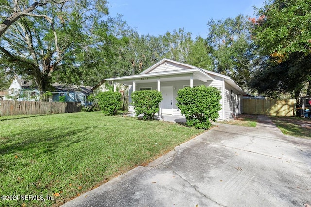 view of home's exterior with a lawn