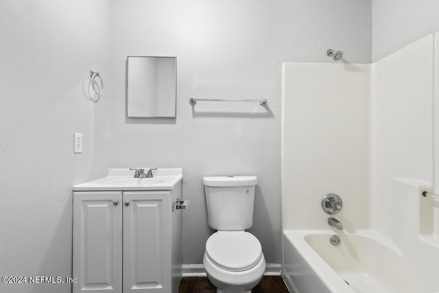 full bathroom with vanity, shower / bath combination, and toilet