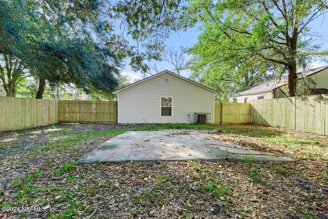 back of house featuring a patio area and central AC