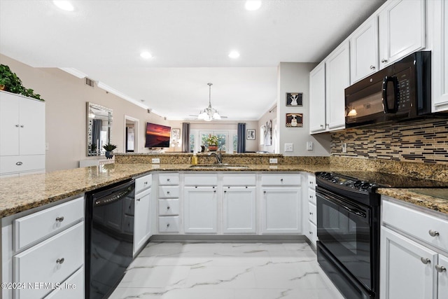 kitchen featuring kitchen peninsula, sink, white cabinets, and black appliances