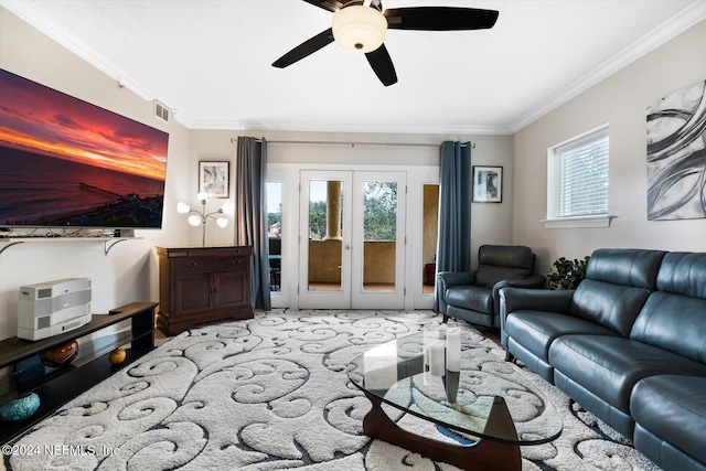 living room with crown molding, french doors, and ceiling fan