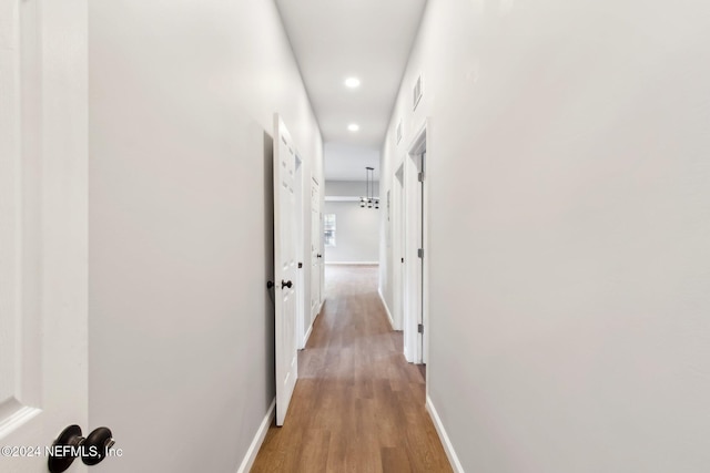 corridor featuring hardwood / wood-style flooring