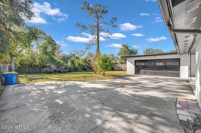 view of patio featuring a garage