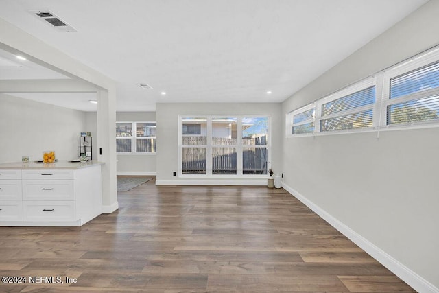 interior space with dark wood-type flooring