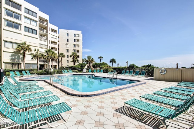 view of pool featuring a patio area