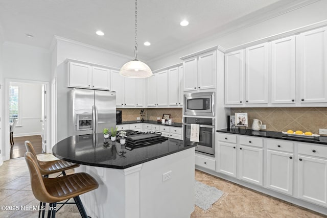 kitchen featuring white cabinets and appliances with stainless steel finishes