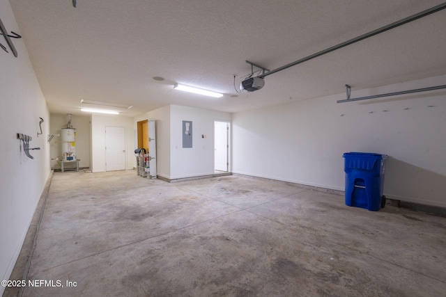 garage featuring electric panel, a garage door opener, and water heater