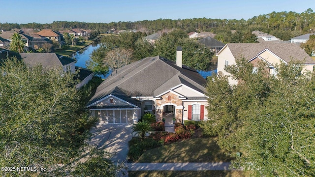 drone / aerial view featuring a water view