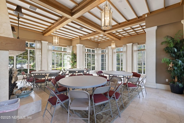 sunroom with beam ceiling and coffered ceiling