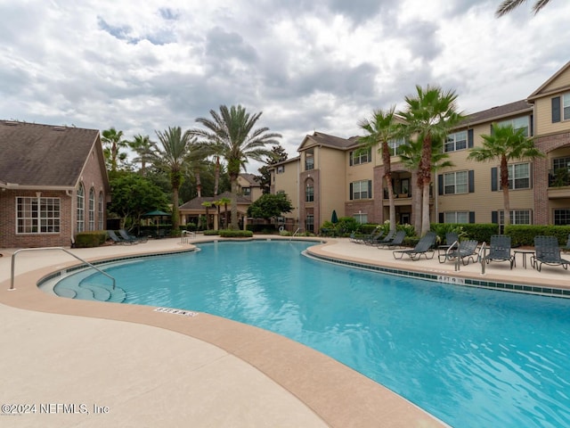 view of pool with a patio