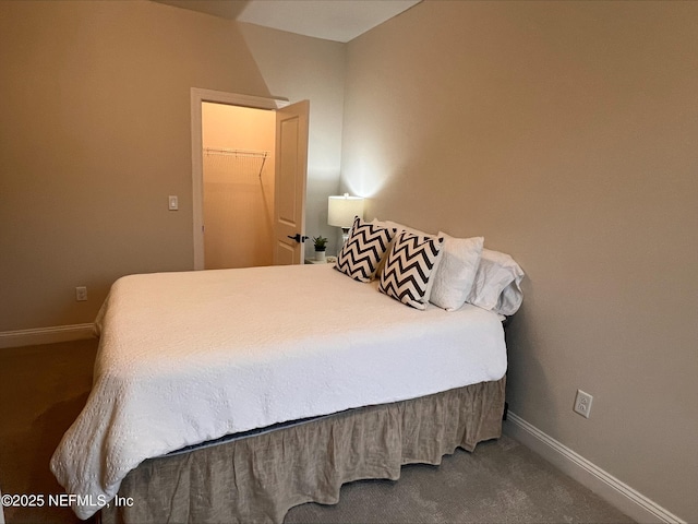 carpeted bedroom with baseboards