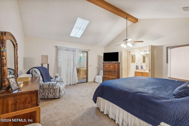 bedroom featuring light carpet, ceiling fan, beam ceiling, high vaulted ceiling, and connected bathroom