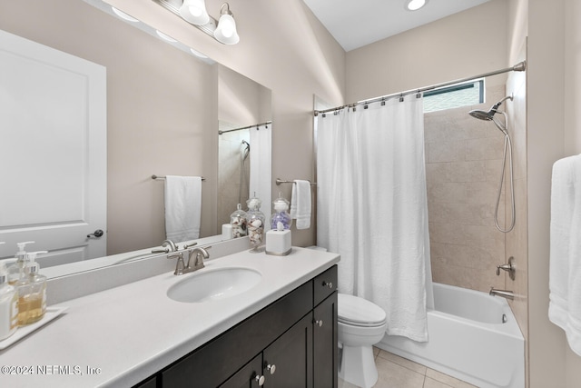 full bathroom with tile patterned floors, vanity, shower / bathtub combination with curtain, and toilet