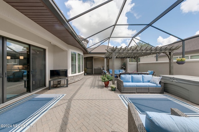 view of patio featuring outdoor lounge area, a lanai, and a hot tub