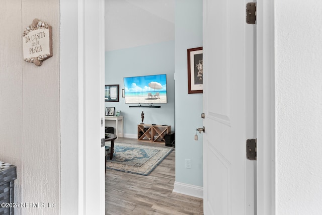 hall featuring hardwood / wood-style flooring