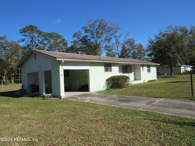 exterior space featuring a front yard and a garage