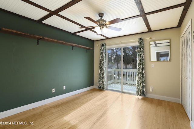 spare room with ceiling fan and light wood-type flooring