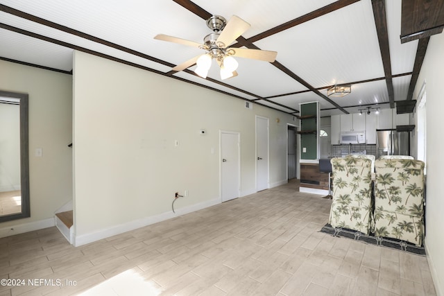 unfurnished living room with light hardwood / wood-style floors and ceiling fan