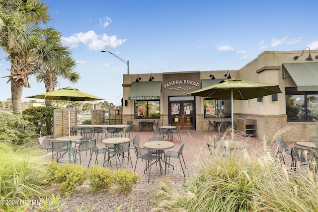 view of patio featuring exterior bar