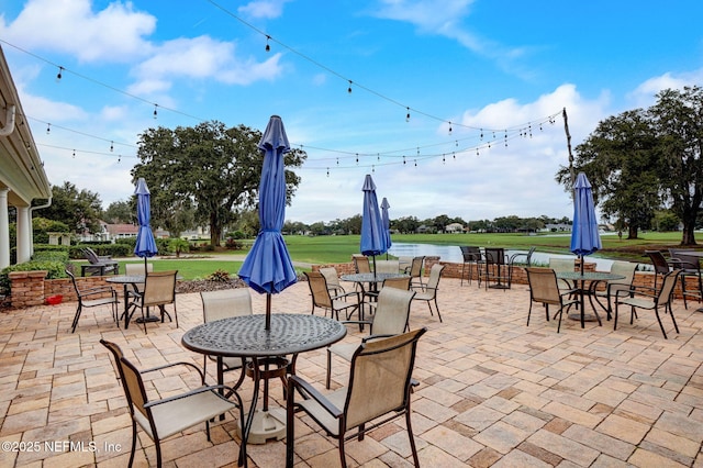 view of patio / terrace with a water view