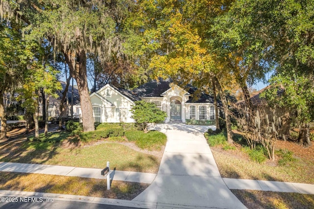 view of property hidden behind natural elements